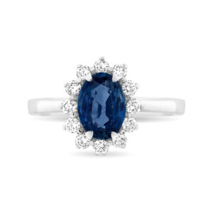 Anillo de oro blanco con zafiro central rodeado de diamantes