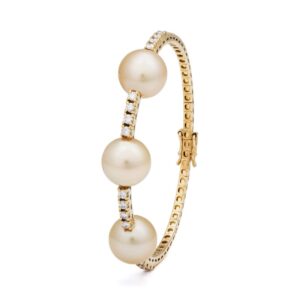 Brazalete de oro amarillo con diamantes y perlas