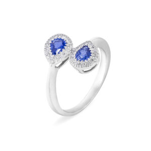 Anillo de oro blanco estilo tú y yo con diamantes y zafiros